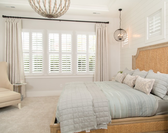 Plantation shutters in a bedroom